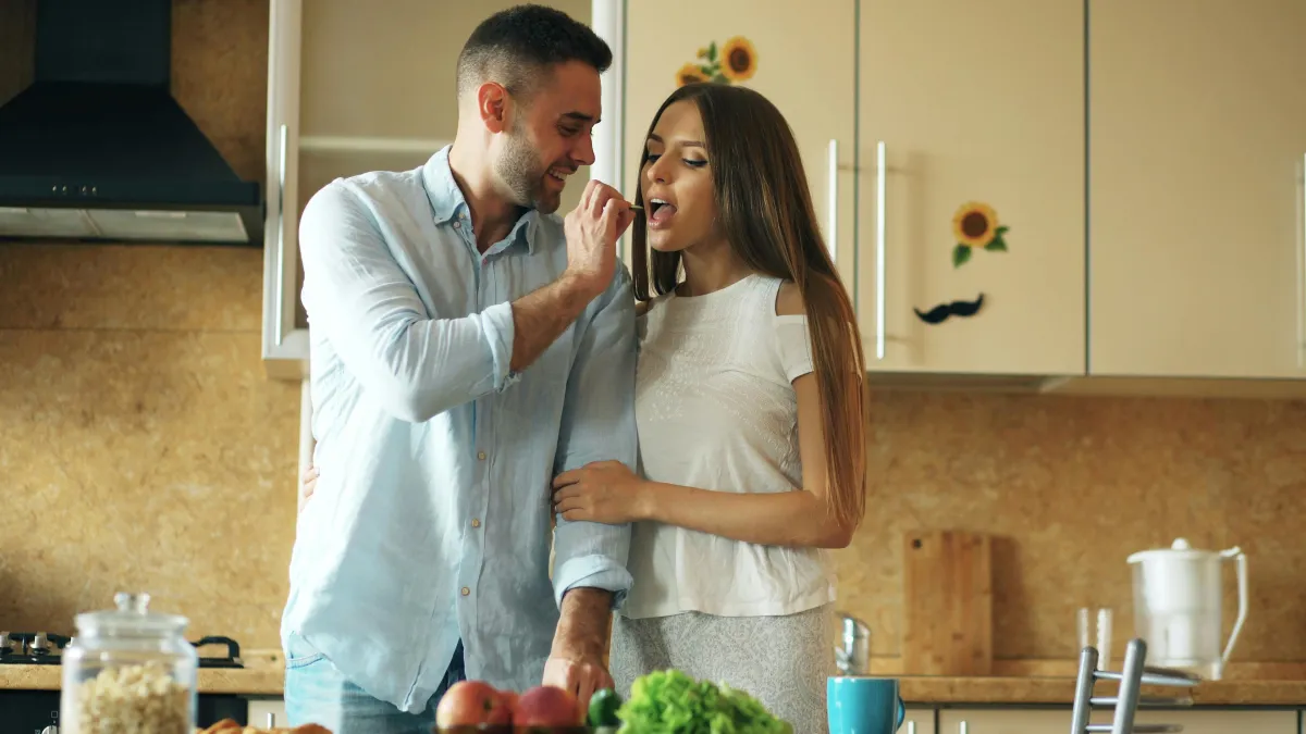 Couple sharing a small moment of connection in daily life, small gestures relationship
